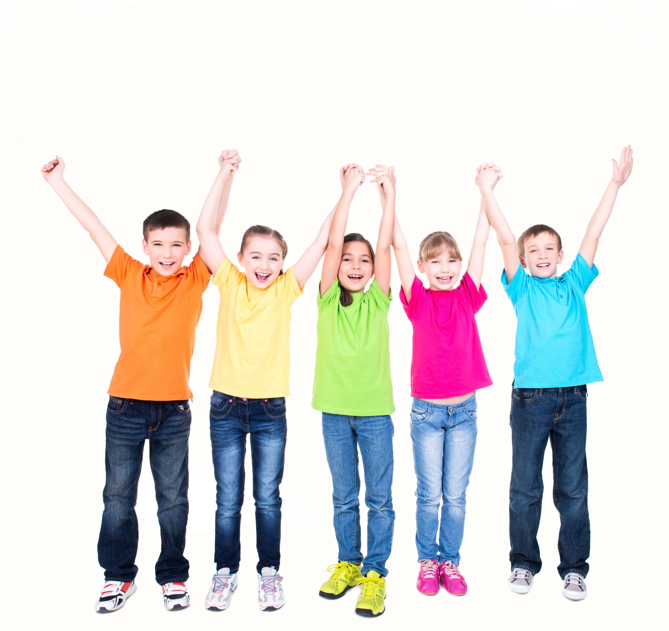 Group of smiling kids with raised hands in colorful t-shirts standing together - isolated on white.
